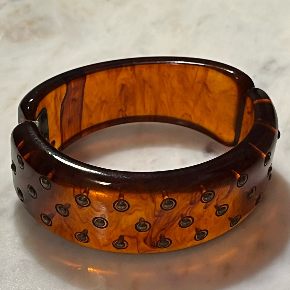Vintage brown hinged Bakelite bangle with studs